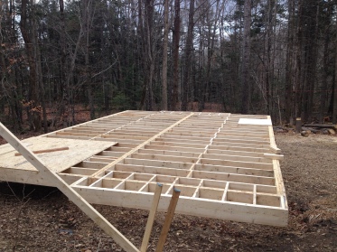 Main deck, fully framed. The plywood areas are the bathroom and the entryway, where there will eventually be tile.