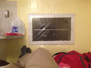 Plastic over the windows = ready for the deep freeze.